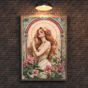 May include: A vintage-style illustration of a woman with long red hair, wearing a white dress and surrounded by pink flowers. The artwork is framed in a wooden frame.