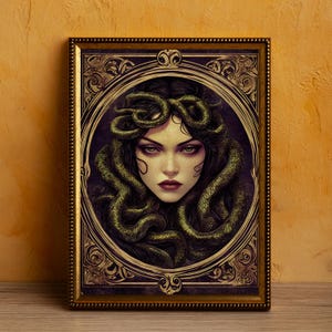 May include: A framed illustration of a woman with snakes for hair. The woman has dark hair and a serious expression. The frame is ornate and gold with a dark purple background.