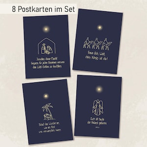 Può includere: Un set di otto cartoline blu navy con illustrazioni e testo in oro. Ogni cartolina presenta una scena della Natività diversa, tra cui una stella, una mangiatoia, i tre re magi, un angelo e testo in tedesco. Il testo include frasi come "Nel mezzo di questa notte".