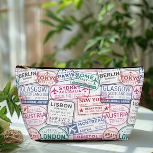 Traveler Passport Stamp Accessory Pouch | Pilot Flight Attendant Organizer Bag | Wanderlust Travel Toiletry Case | Aviation Theme Makeup Bag