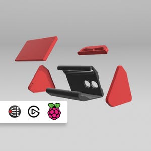 Puede incluir: Una carcasa roja y negra desmontada para una computadora Raspberry Pi. La carcasa está hecha de plástico y tiene un diseño elegante y moderno.