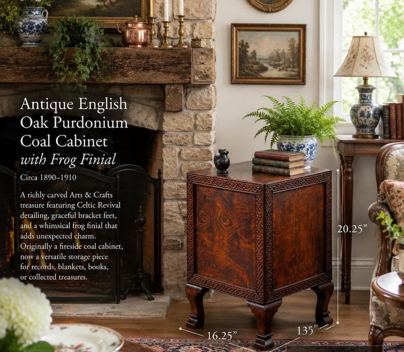 May include: Antique English Oak Purdonium Coal Cabinet with Frog Finial. This Arts & Crafts treasure features Celtic Revival detailing and graceful bracket feet. Dimensions: 16.25" W x 13.5" D x 20.25" H.