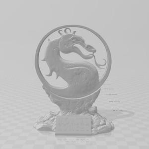 May include: A white 3D printed figurine of the Mortal Kombat logo. The logo features a dragon with its head turned to the side and its mouth open. The figurine is on a base with the words "Mortal Kombat" written on it.