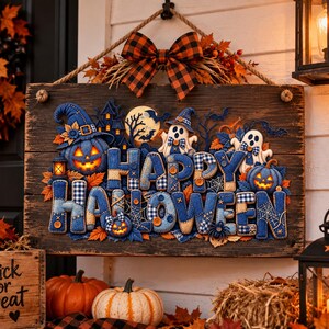 May include: A rectangular wooden sign featuring the text HAPPY HALLOWEEN in blue fabric letters with plaid accents. The design includes felt ghosts, glowing orange jack-o'-lanterns, a haunted house, bats, and a large orange and black buffalo plaid bow.