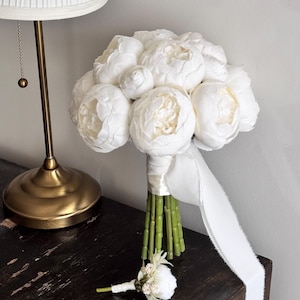 White peony bridal bouquet and boutonniere
