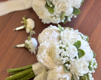 Magnificent natural artificial bouquet with white flowers And boutonniere