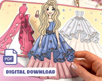 Könnte beinhalten: Ausdruckbare Papierpuppe mit einer Puppe mit blonden Haaren und drei verschiedenen Kleideroptionen. Die Kleider sind rosa, blau und weiß. Die Puppe trägt ein blaues Kleid mit rosa und weißen Akzenten. Der Text "DIGITALER DOWNLOAD" befindet sich am unteren Rand des Bildes.