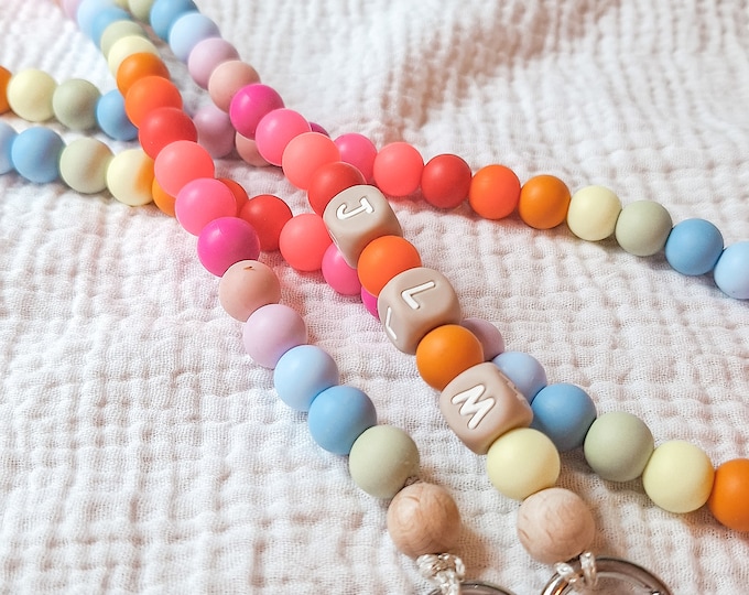 Individual and personalized phone chain made entirely to your wishes from silicone beads in various colors and lengths.