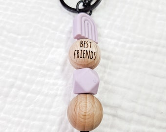 Keychain with purple rainbow, silicone beads and wooden balls Best Friends, black nylon strap, black ring and carabiner