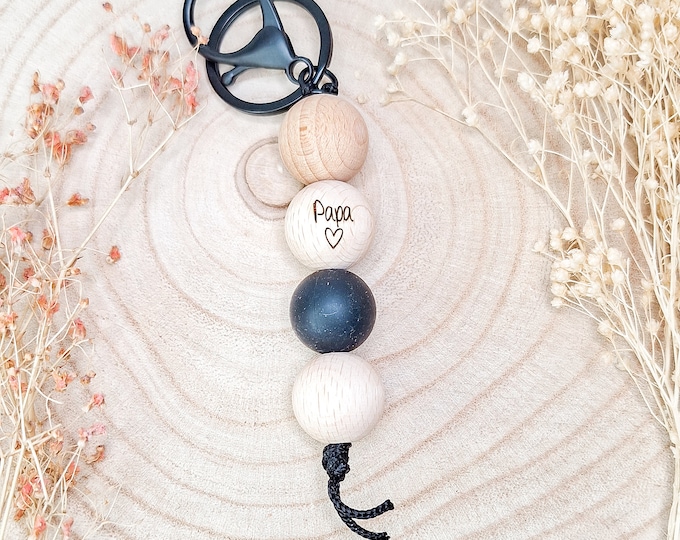 Keyring with engraved wooden ball and colored silicone ball