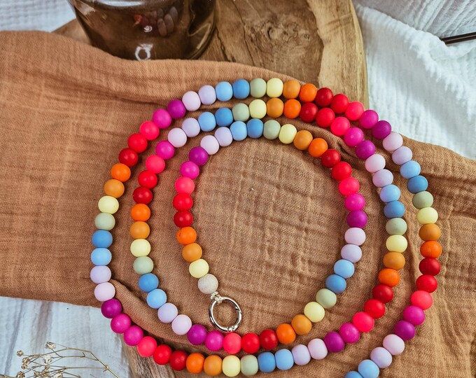 Silicone bead phone chain in rainbow colors with two hooks for all models, without case, in various lengths. Custom requests possible.