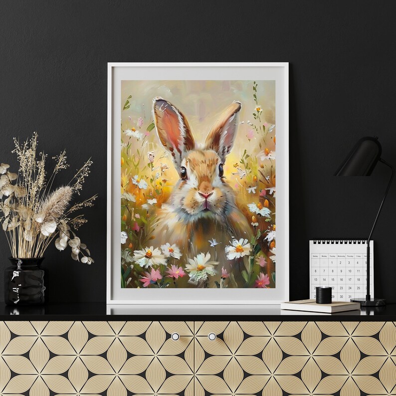 May include: A painting of a brown rabbit with white fur sitting in a field of white and pink flowers. The rabbit has long ears and a fluffy tail. The background is a soft yellow and green.