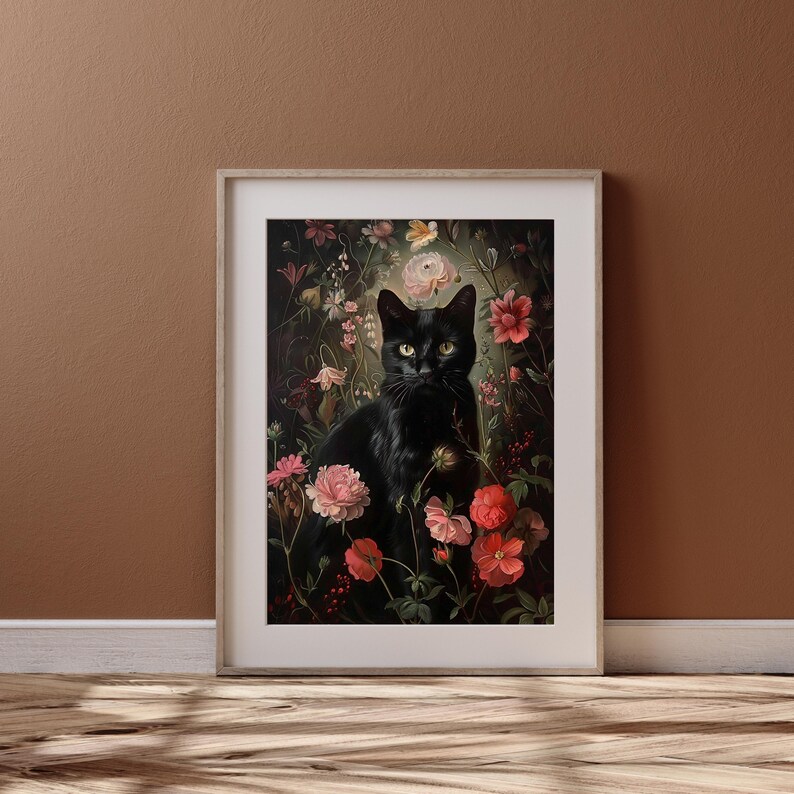May include: A black cat sits in a lush garden setting, surrounded by pink, red, and white flowers. The cat has green eyes and is looking directly at the viewer.