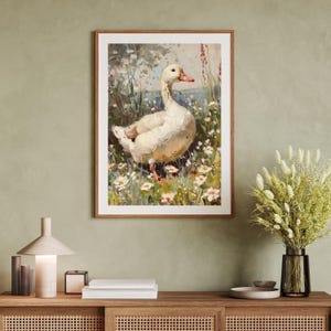 May include: A painting of a white duck standing in a field of white flowers. The duck is facing to the right and has its head turned to the left. The background is a blurry green and brown.