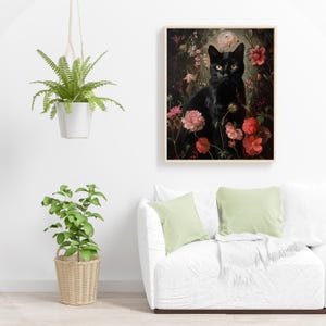 May include: A black cat sits in a lush garden setting, surrounded by vibrant pink and red flowers. The cat's piercing yellow eyes and sleek black fur stand out against the colorful floral backdrop.