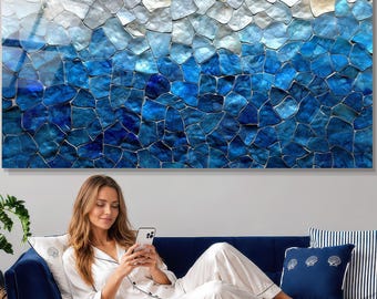 May include: A rectangular wall art piece featuring a mosaic pattern of iridescent shell-like tiles. The design transitions from white and light gray at the top to deep shades of blue at the bottom, creating a gradient effect across the surface.