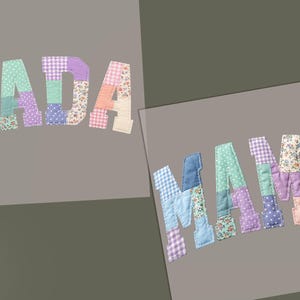 May include: Two square gray panels featuring fabric applique letters. The left panel displays the word DADA and the right panel displays the word MAMA. Each letter is constructed from various pastel-colored fabric patches with gingham, floral, and polka dot patterns.