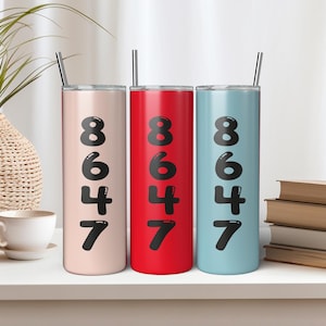 May include: Three stainless steel tumblers with lids and straws. The tumblers are pink, red, and blue. Each tumbler has the number 8647 printed on it in black.