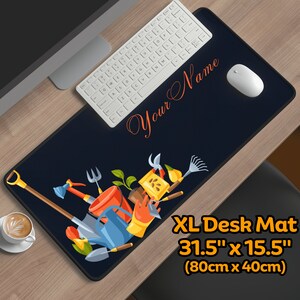 May include: A blue desk mat with a gardening theme. The mat features a variety of gardening tools, plants, and a watering can. The mat is 31.5 inches by 15.5 inches (80 cm by 40 cm).