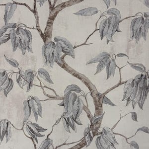 May include: A repeating pattern of a tree with gray leaves and brown branches against a light beige background. The leaves have a detailed, textured appearance, and the branches are intricately drawn.