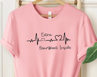 Camiseta Extra Heartbeat Inside: Anúncio de gravidez e revelação do bebê