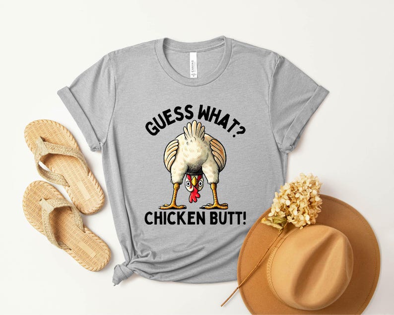 a t - shirt that says guess what chicken butt