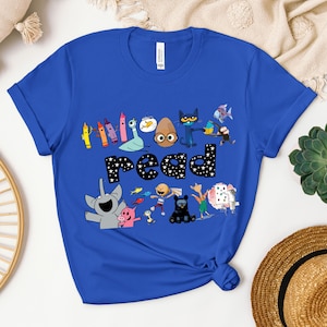May include: A royal blue t-shirt with a graphic of characters from the book "The Book With No Pictures" and the word "read" in white letters with black stars.