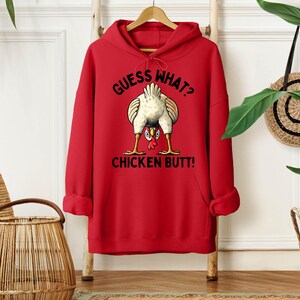 a red hoodie with a picture of a chicken on it