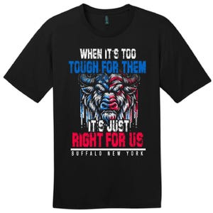 May include: Black t-shirt featuring a graphic of a bull's head with a patriotic design in red, white, and blue. The text reads "WHEN IT'S TOO TOUGH FOR THEM, IT'S JUST RIGHT FOR US, BUFFALO NEW YORK."