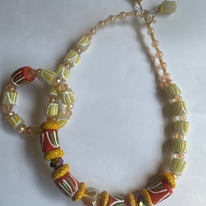 Handmade African wedding jewellery set with necklace bracelet and earrings. Traditional wedding.