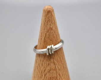 silver ring with gold element