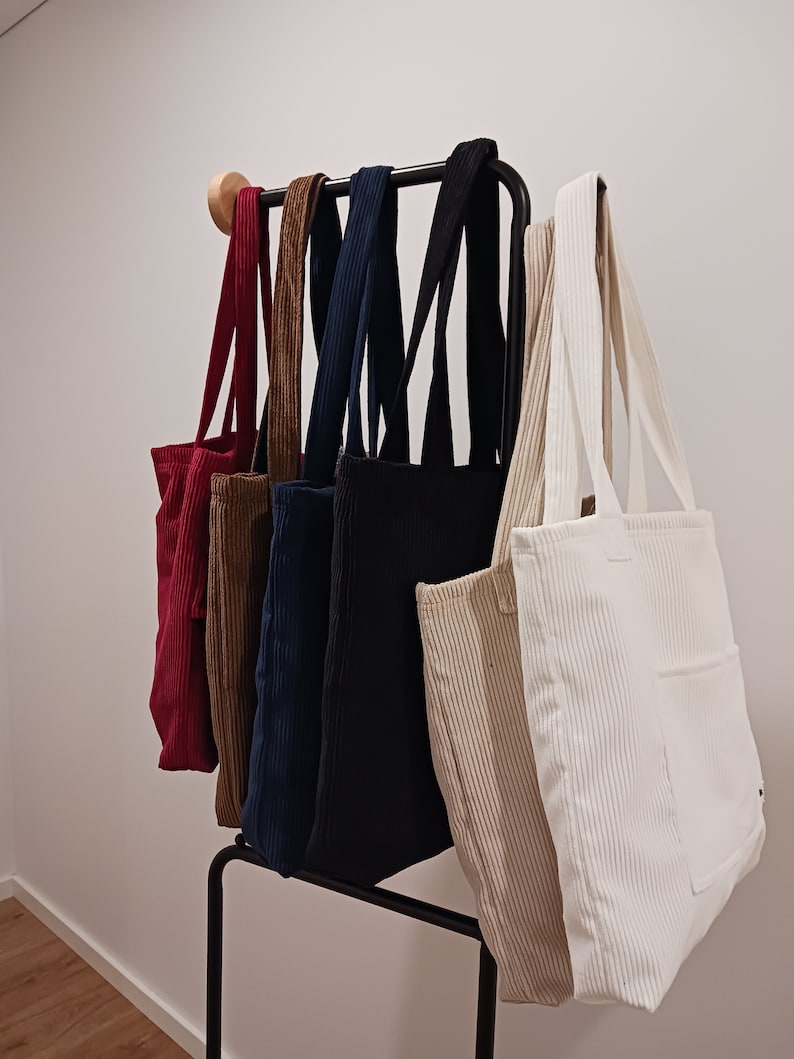 Dimensions: 35x40 cm
Material: High-quality corduroy fabric
Spacious interior: Ideal for groceries, books, essentials, and more
Sturdy handles: Comfortable to carry on your shoulder or by hand
Soon will be available in a range of attractive colors.