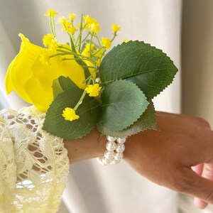 Yellow Rose & Baby’s Breath Pearl Wristband Corsage