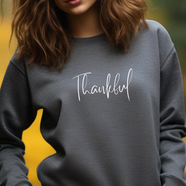 Seasonal knitwear expressing thankfulness Gratitude pullover Thankful sweater Comfortable autumn knit Trendy fall fashion with Thankful text