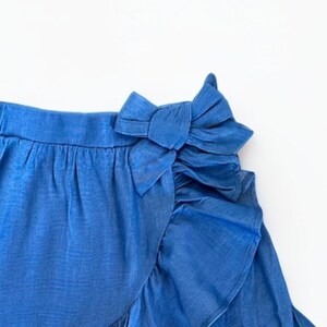 Closeup of Girls Ruffle Wrap Mini Skirt.