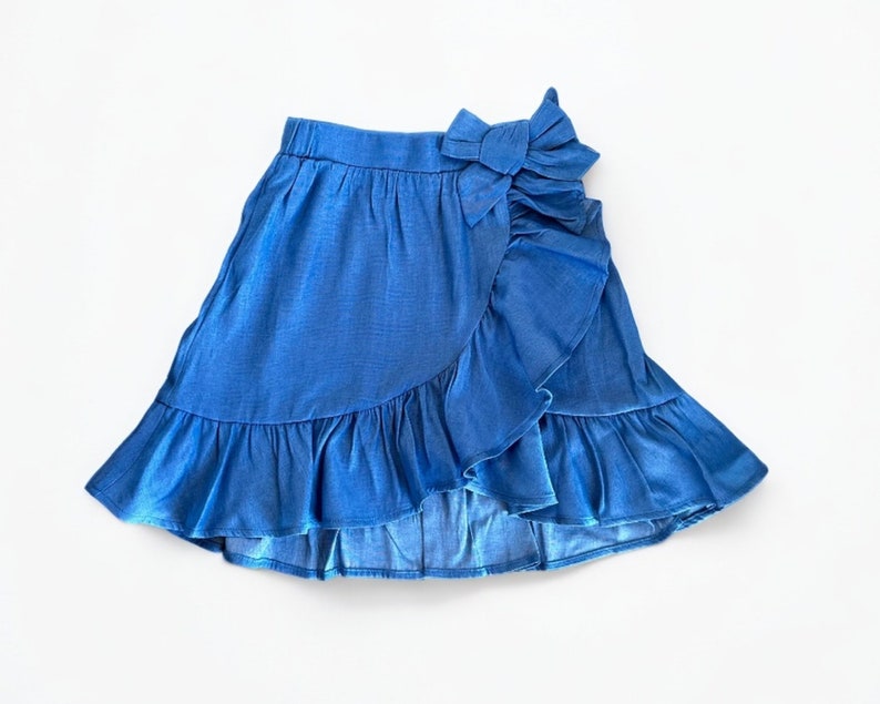 Front view of Girls Ruffle Wrap Mini Skirt.