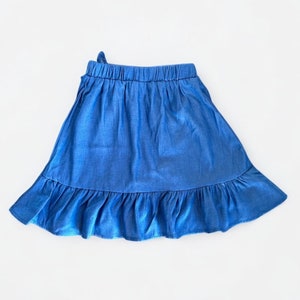 Back view of Girls Ruffle Wrap Mini Skirt.