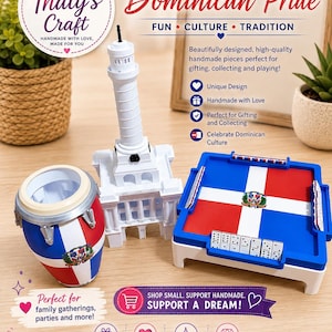 May include: A set of Dominican-themed items including a drum with the national flag, a white model of a lighthouse monument, and a square domino table featuring the Dominican Republic flag and coat of arms with domino tiles placed on the edges.