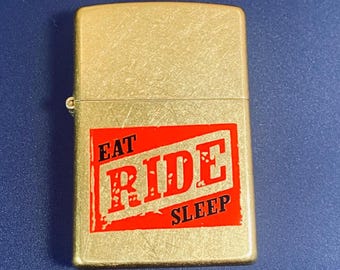 Vintage Zippo Lighter Original 2000s Brass Lighter Eat Ride Sleep Made in U.S.A.