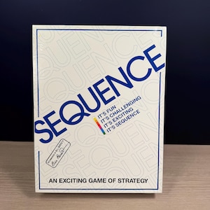 May include: A white board game box with the word "SEQUENCE" in large blue letters. The box also features the text "IT'S FUN, IT'S CHALLENGING, IT'S EXCITING, IT'S SEQUENCE" and "AN EXCITING GAME OF STRATEGY".