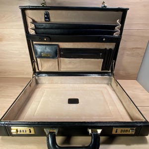 Porte-documents vintage Geoffrey Beene en cuir noir, double cadenas à combinaison, rangement spacieux