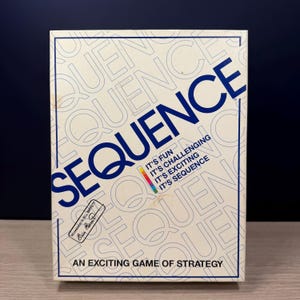 May include: A vintage board game box titled "SEQUENCE" in navy blue, with a repeating pattern of the word "SEQUENCE" in light blue. The box features text that reads "It's Fun, It's Challenging, It's Exciting, It's Sequence" and "An Exciting Game of Strategy."