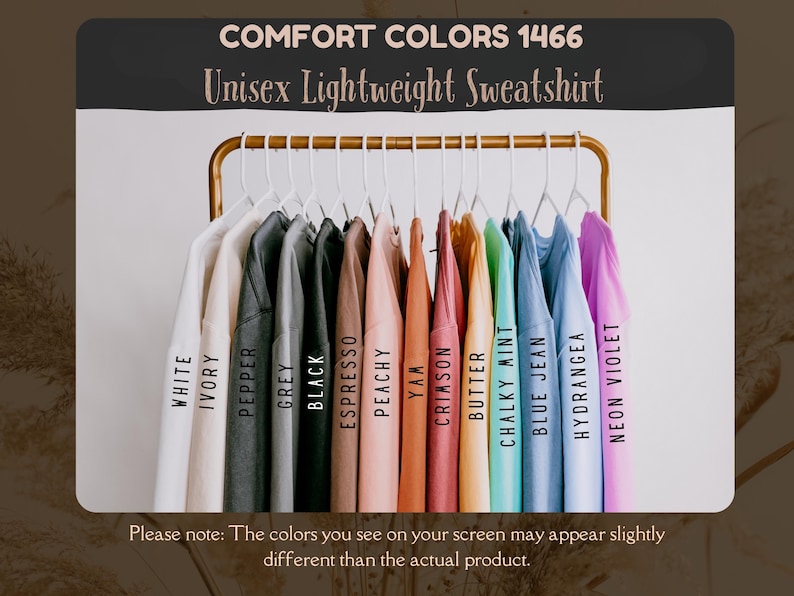 May include: A display of unisex lightweight sweatshirts in various colors, including white, black, and blue jean, hanging on a gold rack. The text "COMFORT COLORS 1466" and "Unisex Lightweight Sweatshirt" are visible.