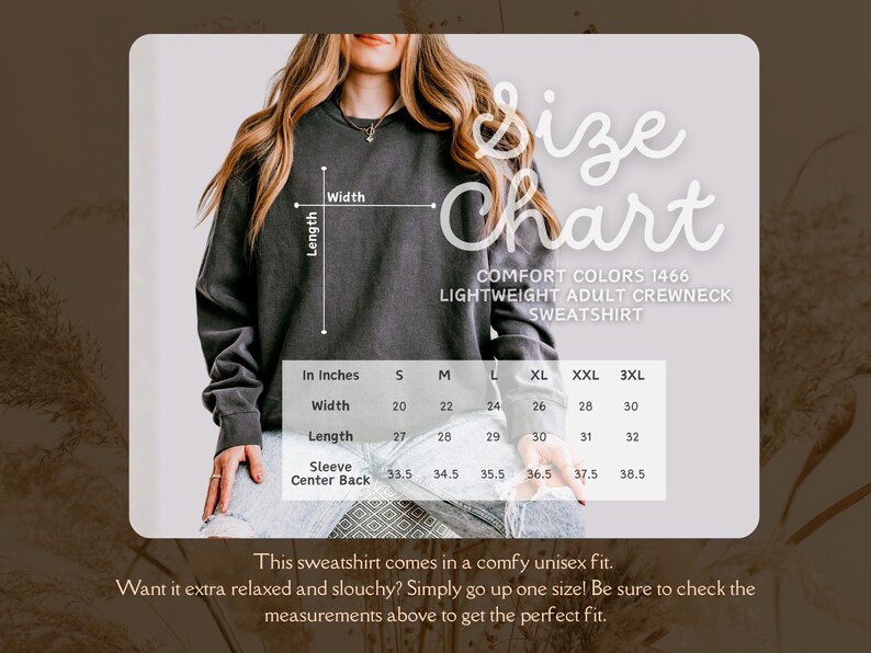 May include: A size chart for a Comfort Colors 1466 lightweight adult crewneck sweatshirt. The chart shows measurements in inches for width, length, and sleeve center back, ranging from size S to 3XL. The sweatshirt is shown in a dark gray color.