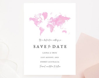 May include: A white wedding invitation with a pink watercolor world map design. The text reads "It's a destination wedding so SAVE the DATE" with the names Laura & Greg, the date August 21st, 2025, and Sydney Australia.