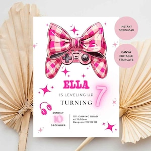 May include: A pink and white plaid bow with a game controller design tops a birthday invitation. The invitation reads "Ella is leveling up turning 7" with event details. Includes "Instant Download" and "Canva Editable Template" text.