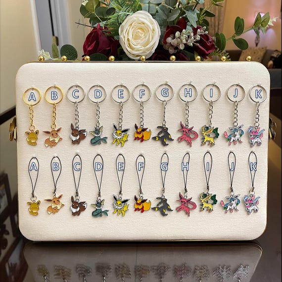 PKM: Keychains, Phone Charms, Necklaces, and Earr… - image 1