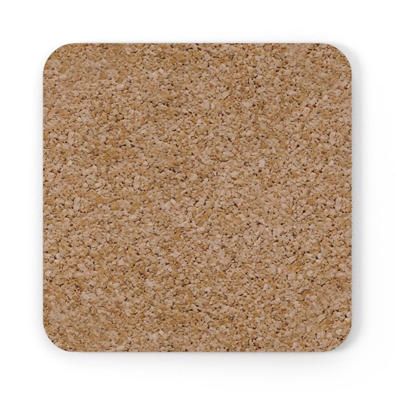 May include: Square cork coaster with rounded corners. The coaster has a light brown, textured surface, ideal for protecting tables from drink condensation. This coaster is a simple, functional item for home or office use.