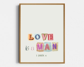 May include: A framed print with the text "LOVE is a MAN" in colourful, cut-out letters. The text is followed by "1 JOHN 4".