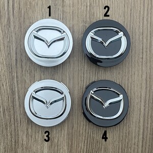 4 Stück Auto Nabendeckel für Mazda 2 3 6 MX-5 MX-30 CX-3 CX-8 CX-9 60mm, Auto  Nabenkappe mit Logo, Auto Radnabendeckel Radnabenabdeckung Felgenkappen  Radkappen Zubehör,C : : Auto & Motorrad